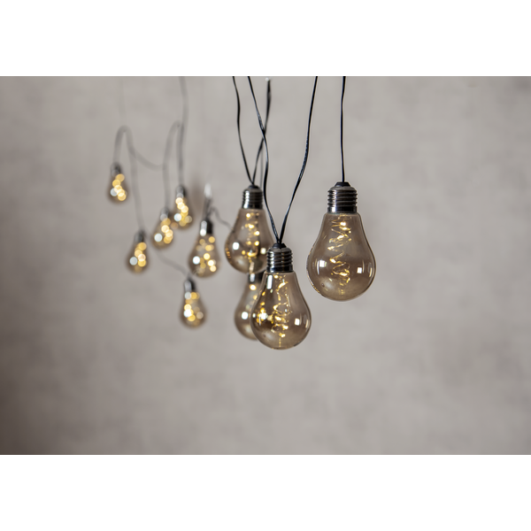 10er Lichterkette mit rauchigem Glas im industrial Design.