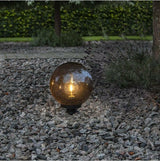 Dekorative runde Gartenleuchte mit Smokey-Glas und einer E27 Fassung  Lichttechnik24.de.