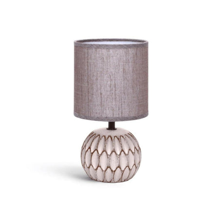 Dekorative Tischlampe aus Keramik mit schöner Struktur und rundem Stoffschirm.