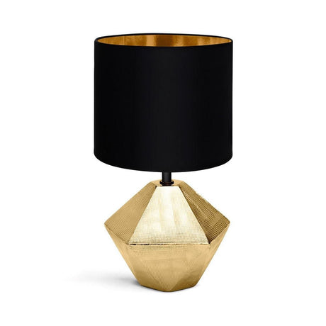 Edle goldfarbene Tischlampe aus Keramik mit 6-eckigem Fuss und schwarzem Stoffschirm.