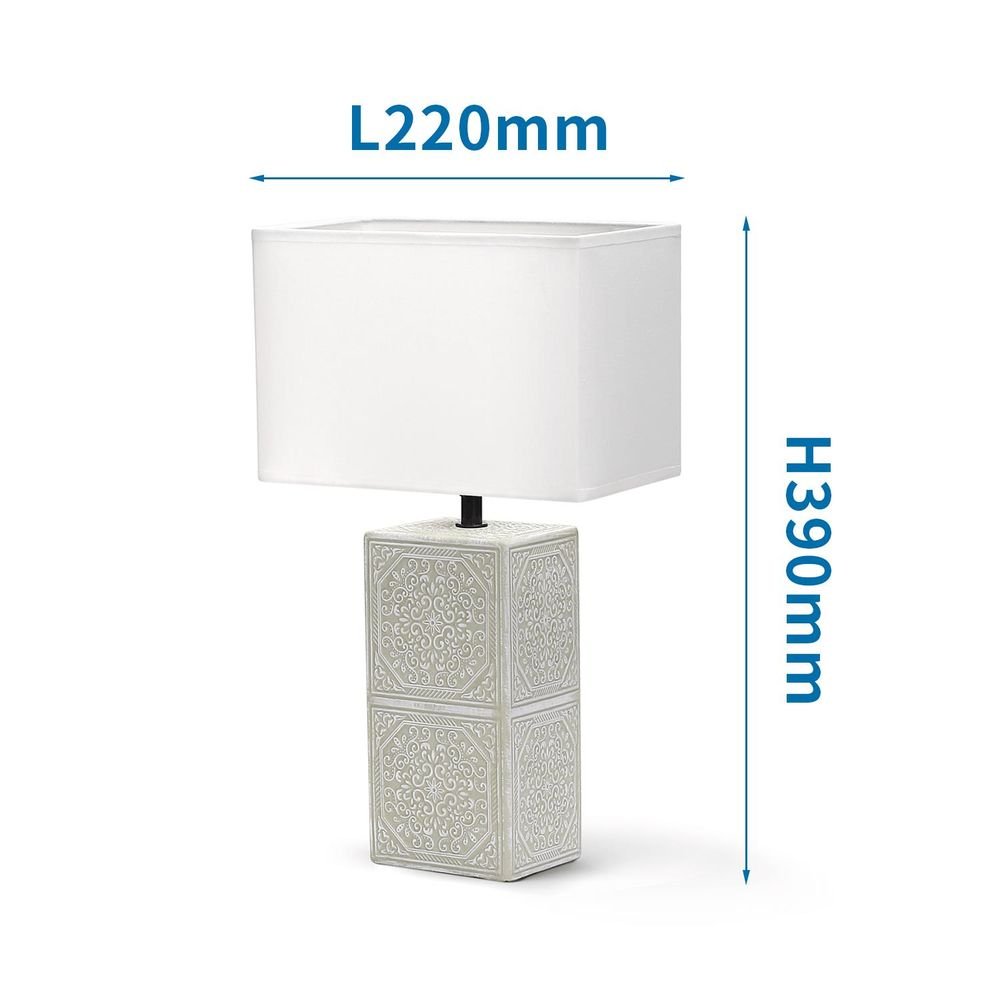 Stilsichere Tischlampe aus Keramik mit  weißem orientalischem Muster und eckigen Stoffschirm.